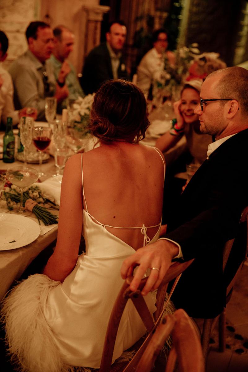 Megan Kelly at her reception at Deux Belettes wearing the Sherry Mini-a silk bridal mini with feather trim