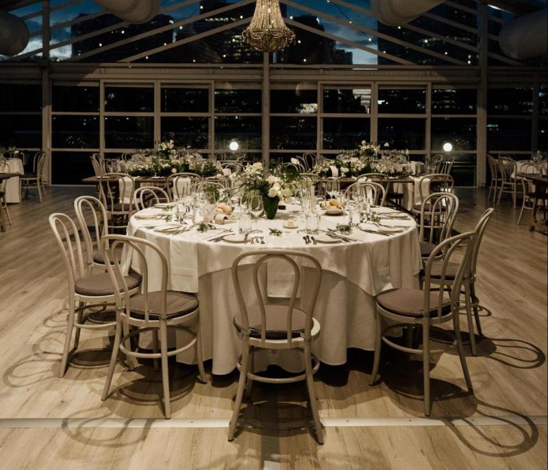 Minimalist details of KWH real bride Jacqui's reception table with white daisies.