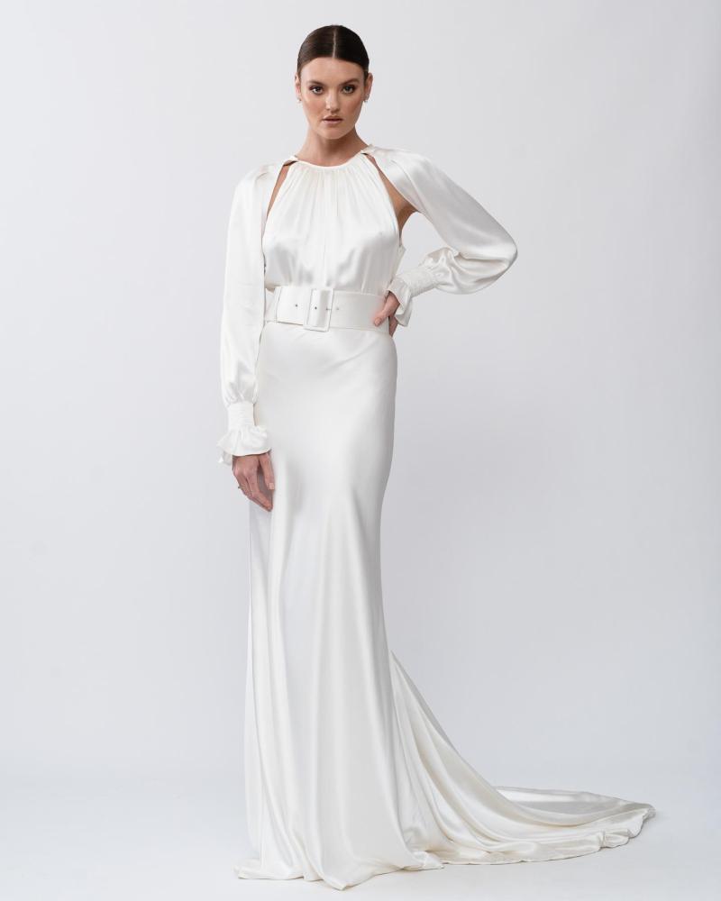 The Enya gown by Karen Willis Holmes, a simple, high neck fit and flare silk satin wedding dress with detachable sleeves.