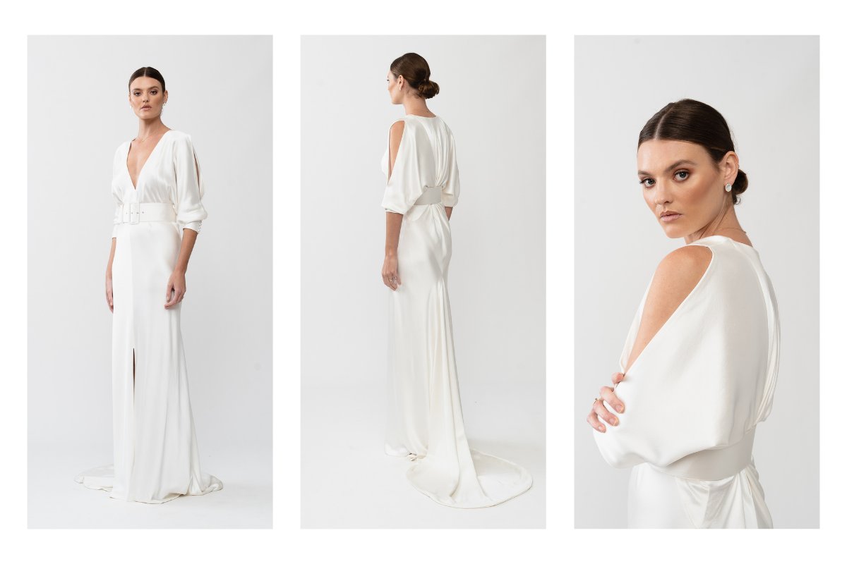 The Margo gown by Karen Willis Holmes, a V-Neck, long sleeve silk satin wedding dress with a fit and flare shape and a split skirt.