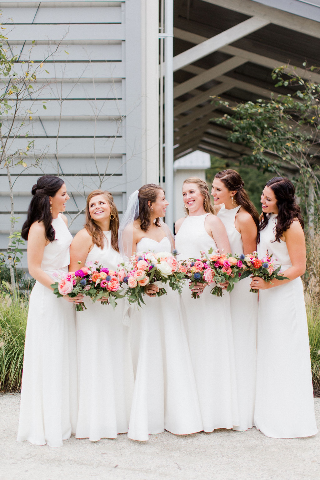 Karen Willis Holmes Kitty Nina Gown photo by Alisandra Photography Image shows Bride with Bridemaids