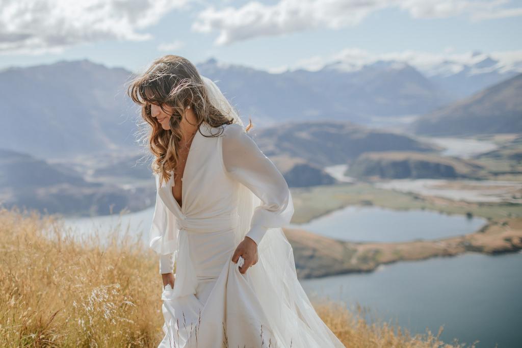 Olive-by Karen Willis Holmes. This modern gown can be ordered with or without long sheer georgette sleeves as seen on Tyler while she climbs the beautfiul mountains in New Zealand