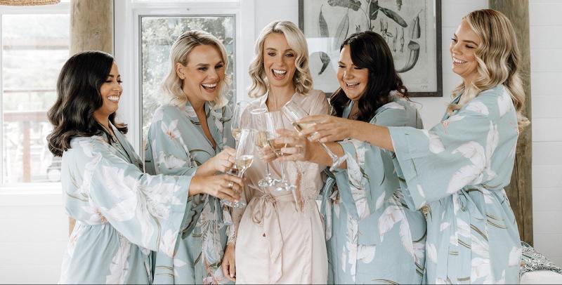 Perry Gown-Karen Willis Holmes, The bride with her bridal party getting ready for her big wedding day