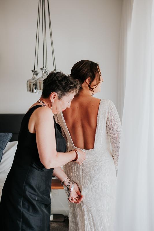 Margareta-Karen Willis Holmes-Victoria & Will- Bride seen getting ready in her show-stopping Margareta gown from our LUXE collection.
