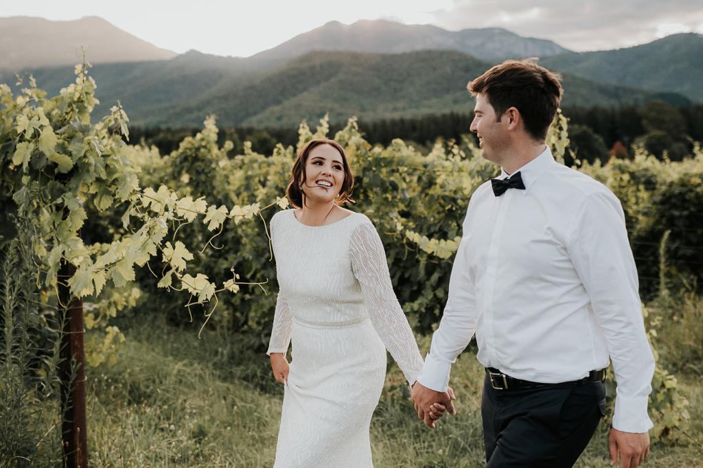 Margareta-Karen Willis Holmes-Victoria & Will- Bride and groom celebrating their love after their ceremony in the middle of at Feathertop Winery in Victoria