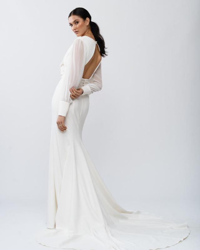The Olive gown by Karen Willis Holmes, a V-Neck wedding dress with a wrap shape.