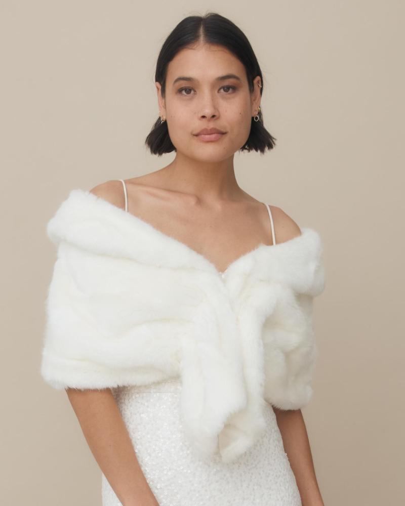 champagne bridal wrap by Unreal fur-a modern wedding cover up made from faux fur