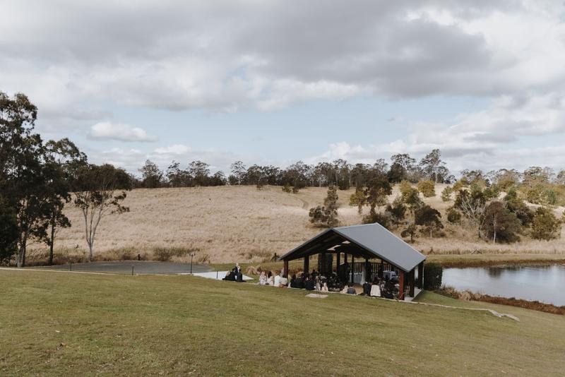 Brie-Karen Willis Holmes - Taylor & Angus - KWH Bride and groom' wedding venue is located out in the country, with beautiful lakes & greenery to create the perfect setting for a minimalists dream.
