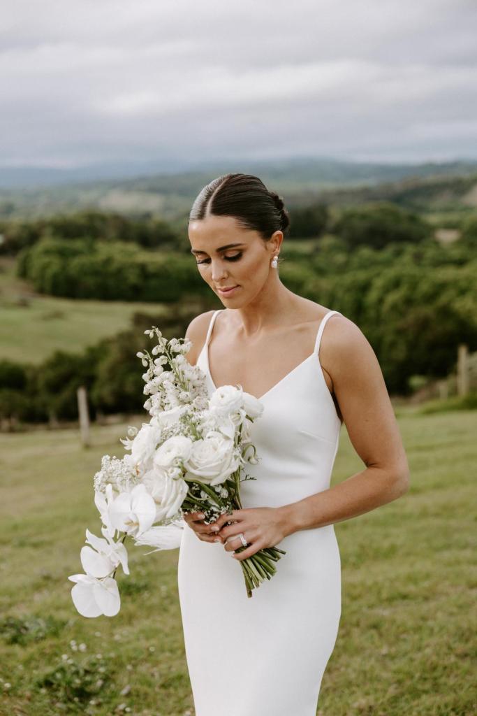 Isadora - karen Willis Holmes - Brydie & Benjamin - Isadora is Finished with feather detailing and a gorgeous long train, this gown is made for an effortless grand entrance (and a grand exit)