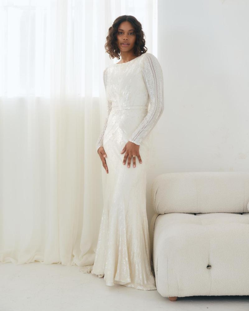 Karrie is a long sleeve beaded wedding dress by Karen Willis Holmes