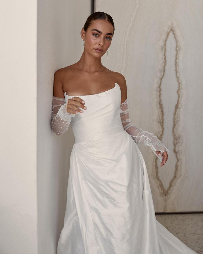 Emma wedding dress made from Silk Shantung paired with our pearl Erin gloves.