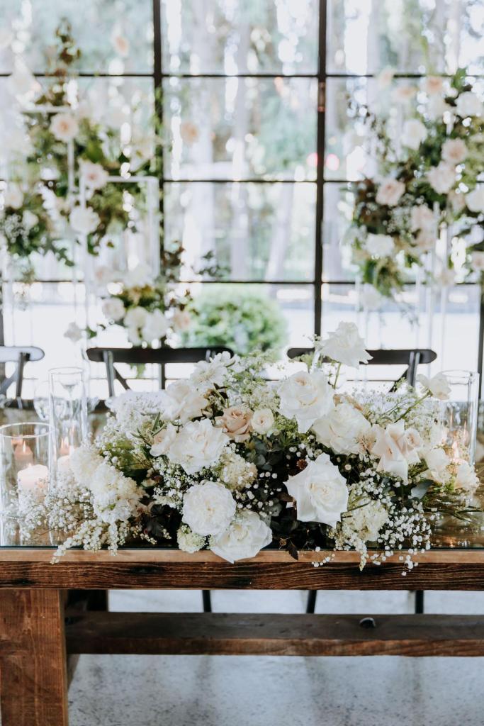 Perry - Karen Willis Homes - Laura & Ben - Bride and Groom have chosen a classic venue, filled with soft and organic structures and endless views of vineyards and rolling hills of greenery.