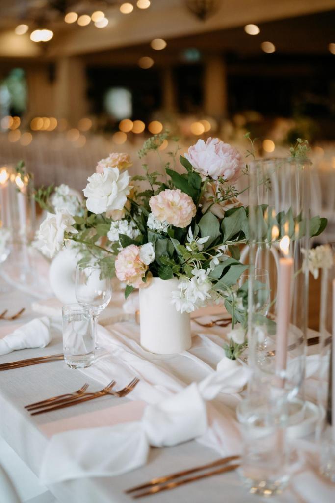 Brooklyn & Jade - Karen Willis Holmes - Stephanie & Ben -Bride and groom has set their wedding venue at the Yarra Valley, full of wood and green hills. The perfect venue for a modern garden wedding. Soft pink florals and off white arrangements are seen.