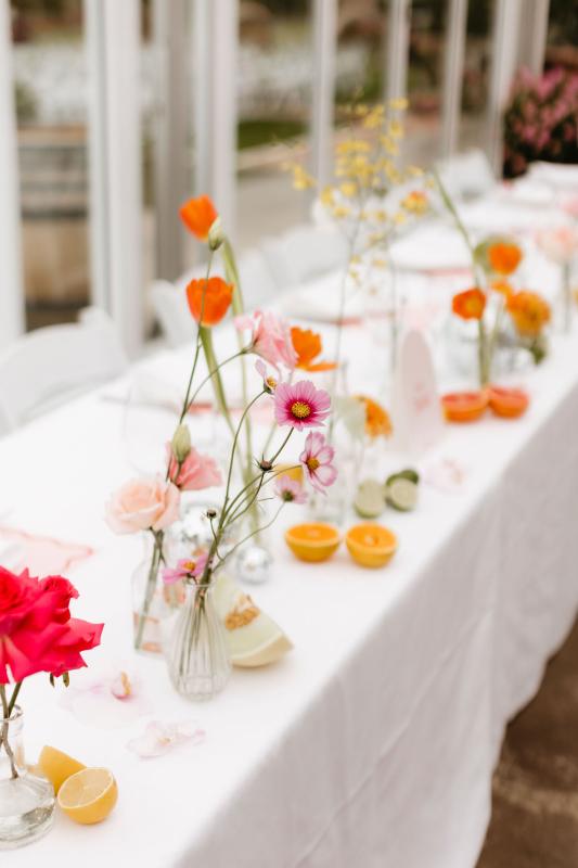 Wedding flowers on bridal tablescape