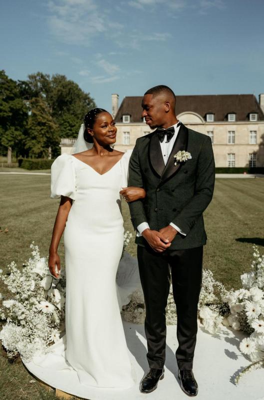 Karen Willis Holmes Real Bride Noémie wearing her Shelby gown from the Elope Collection with statement bubble sleeves and low V back to her France wedding.