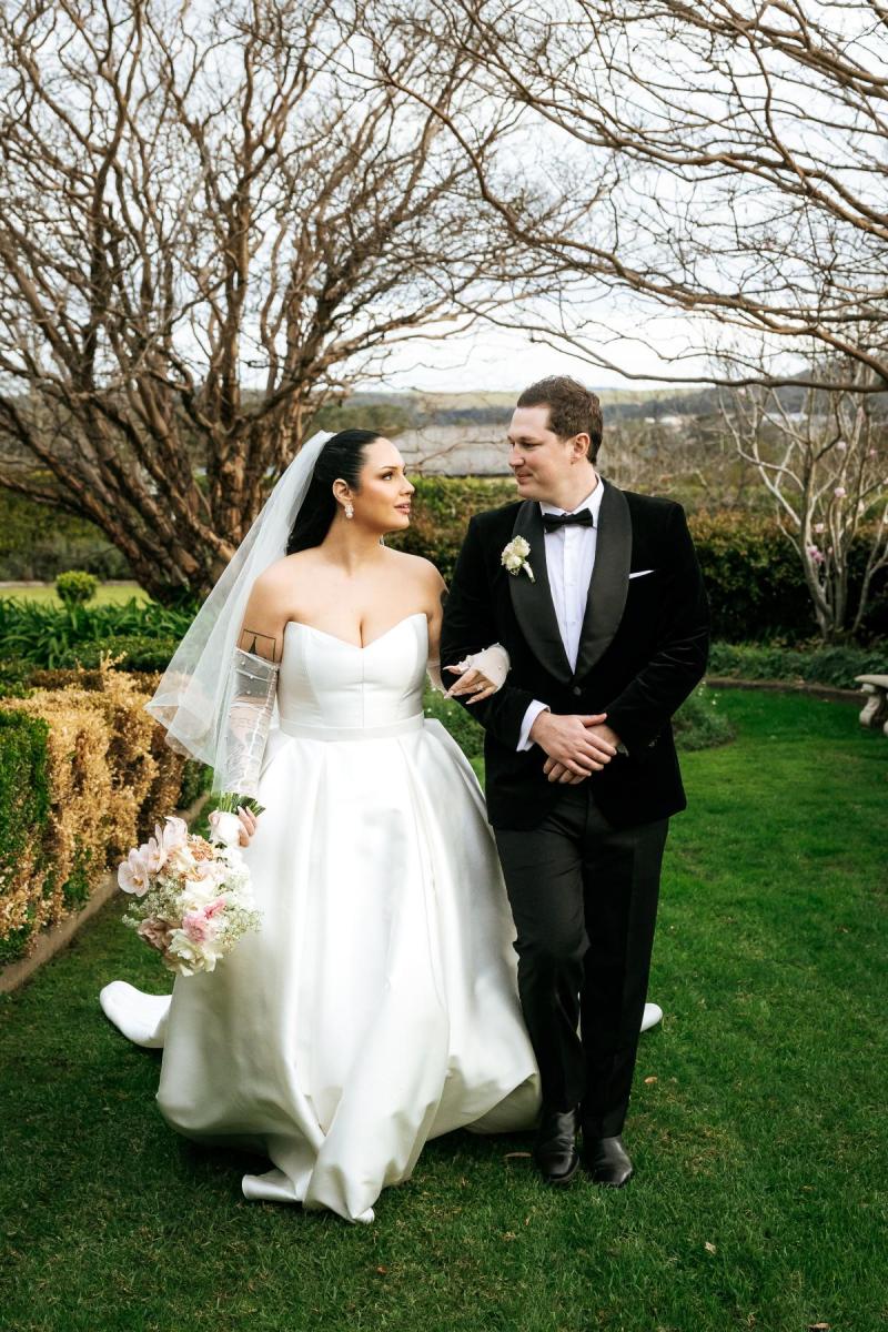 Karen Willis Holmes Real Bride Claudia & Nick wearing her Kitty & Melanie gown from the Bespoke Collection with a sweet hear neck line bodice. Boxed Pleat ballgown skirt. Claudia had a romantic and modern wedding at Ravensthorpe Estate. photographed by Henry Paul Photo.