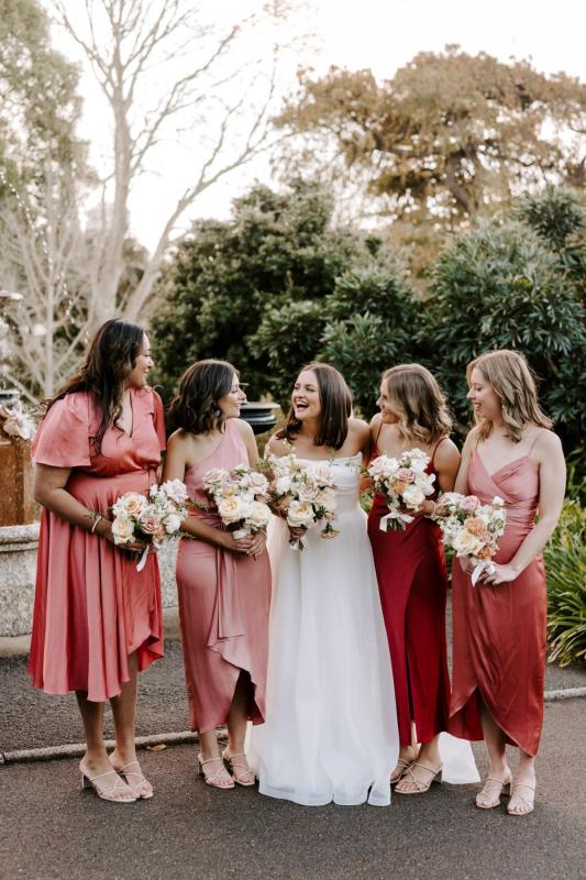 The Lou-Lou & Joni wedding dress by Karen Willis Holmes Bridal is a mikado strapless draped bodice with an A line skirt in organza. Sinead chose to style her gown with KWH Bridal sheer tulle Maddison Wrap.