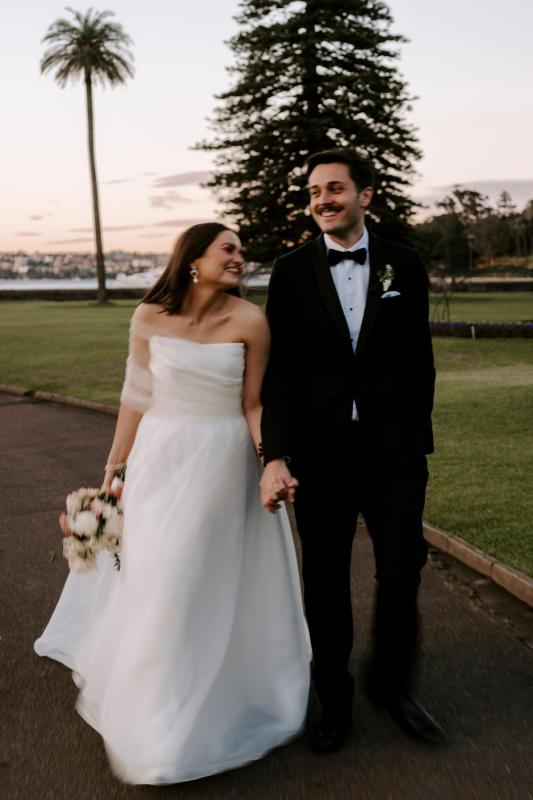 The Lou-Lou & Joni wedding dress by Karen Willis Holmes Bridal is a mikado strapless draped bodice with an A line skirt in organza. Sinaed chose to style her gown with KWH Bridal sheer tulle Maddison Wrap.