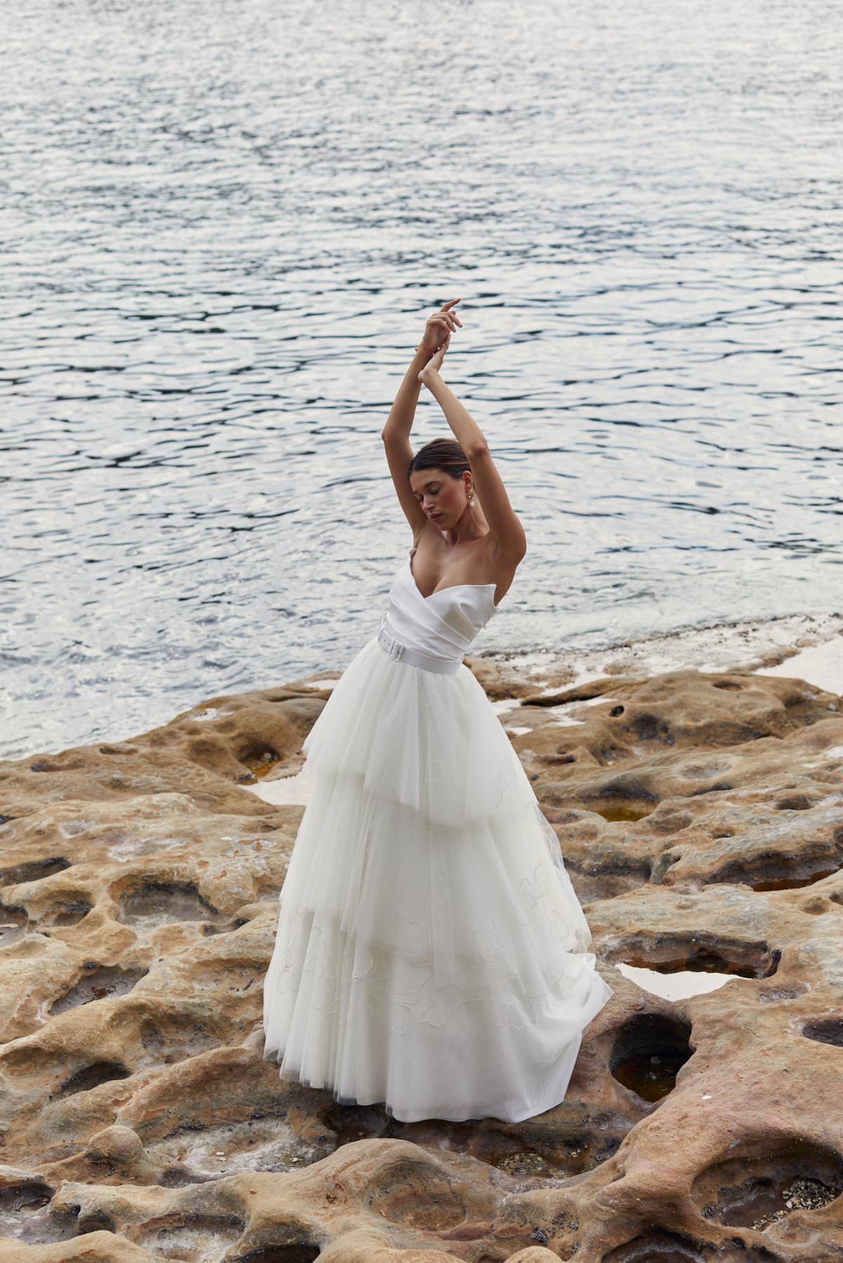 The Alissa & Matilda is for the dreamy bride. The Alissa Bodice features stunning hand draping, with a plunging pointed neckline to highlight your décolletage. The Matilda Skirt is tiered tulle dream Aline skirt.