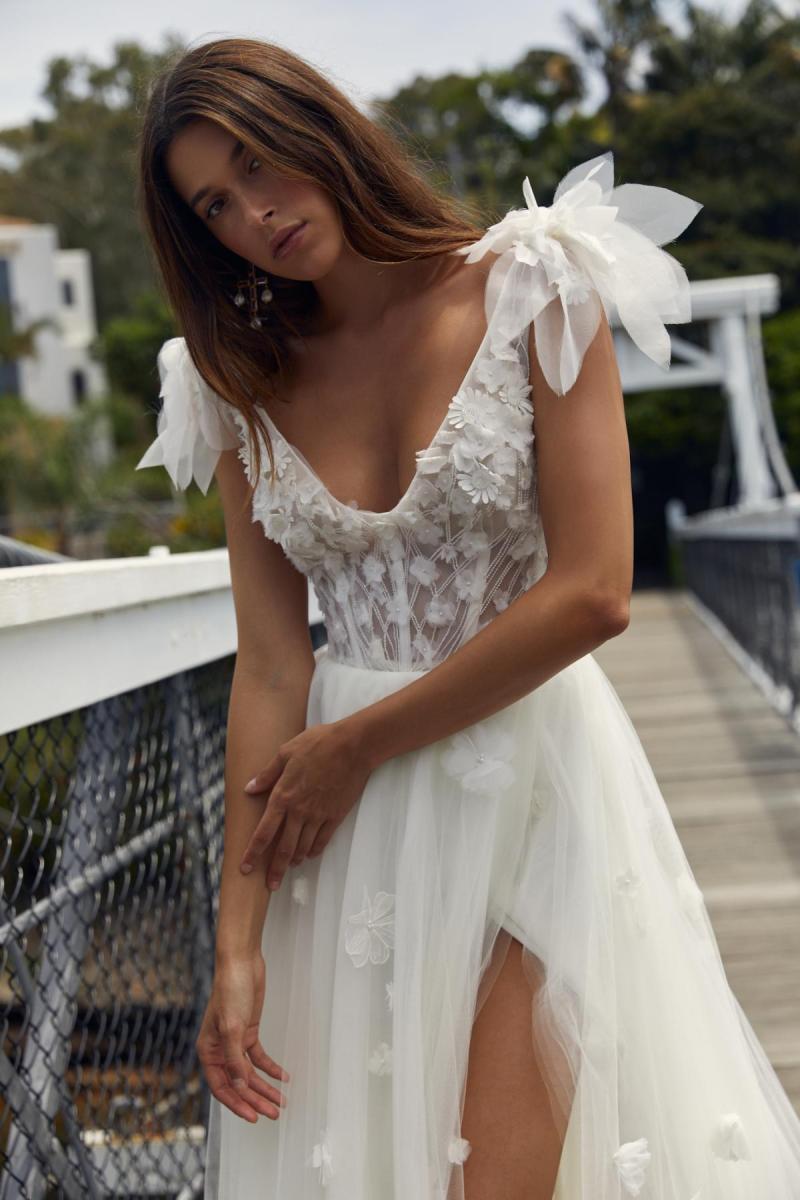 Denisa & Jules is for the ultimate romantic bride. Features a corseted V-neck Bodice, with hand embroidered floral detail, paired with the Floral Jules Skirt (based off our popular plain Jules Skirt) with statement side-split and soft tulle fabric.