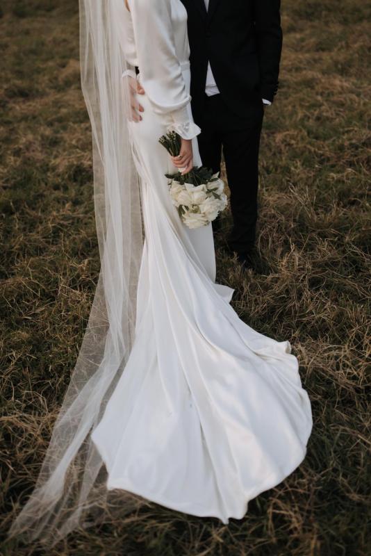 The Enya by Karen Willis Holmes, a simple, silk high neck wedding dress traditional