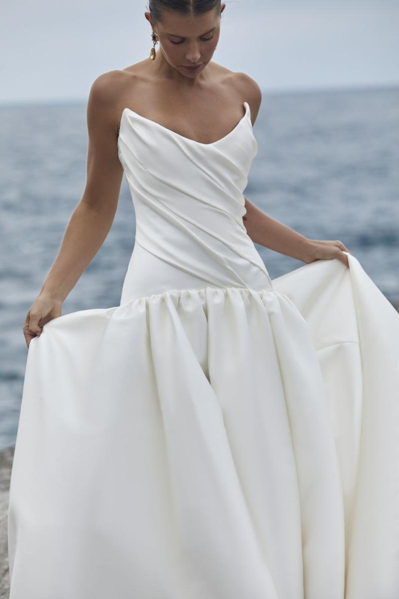 The Alek Wedding Dress from KWH Bridal - Karen Willis Holmes - Drop waist mikado ball gown wedding dress with peaked bodice cups and hand draping detail