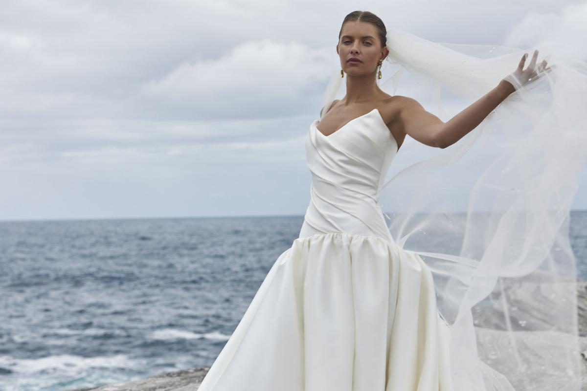 The Alek Wedding Dress from KWH Bridal - Karen Willis Holmes - Drop waist mikado ball gown wedding dress with peaked bodice cups and hand draping detail