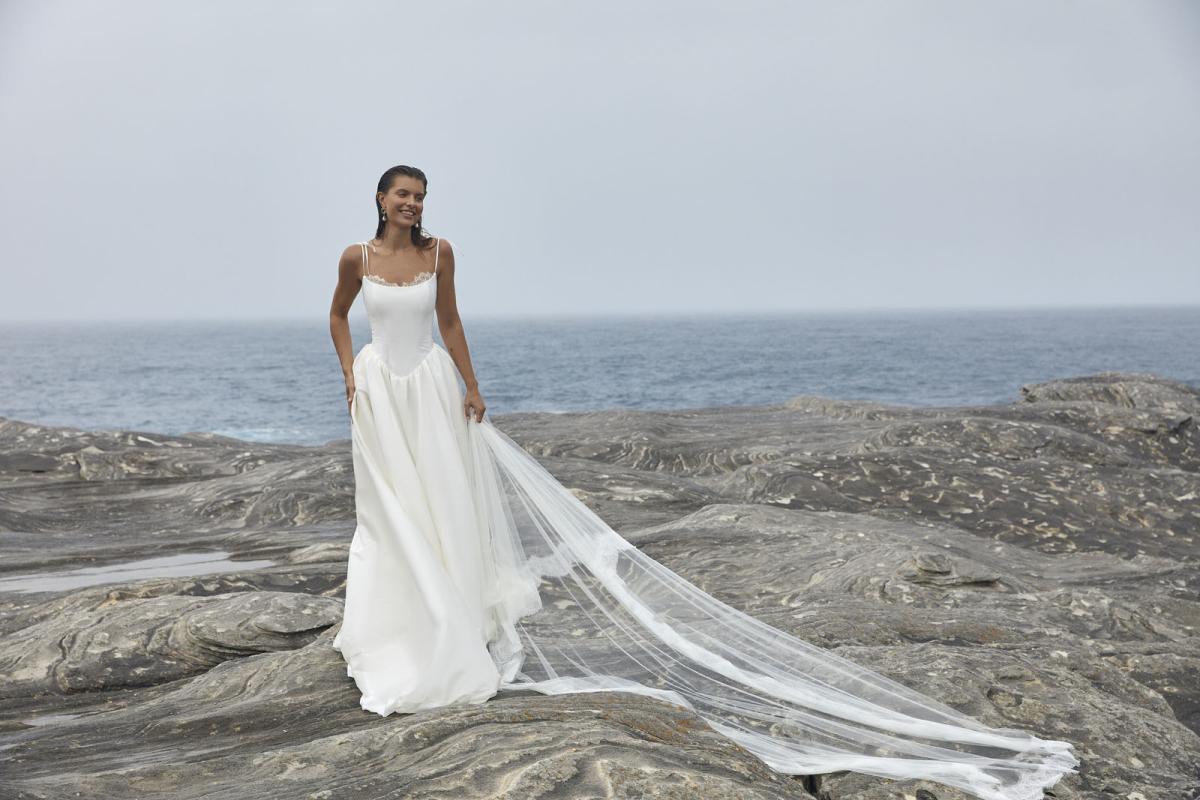 The Ciara wedding dress from KWH Bridal - Karen Willis Holmes - Scoop neck basque waist wedding gown with ballgown skirt in faux silk styled with lace wedding veil