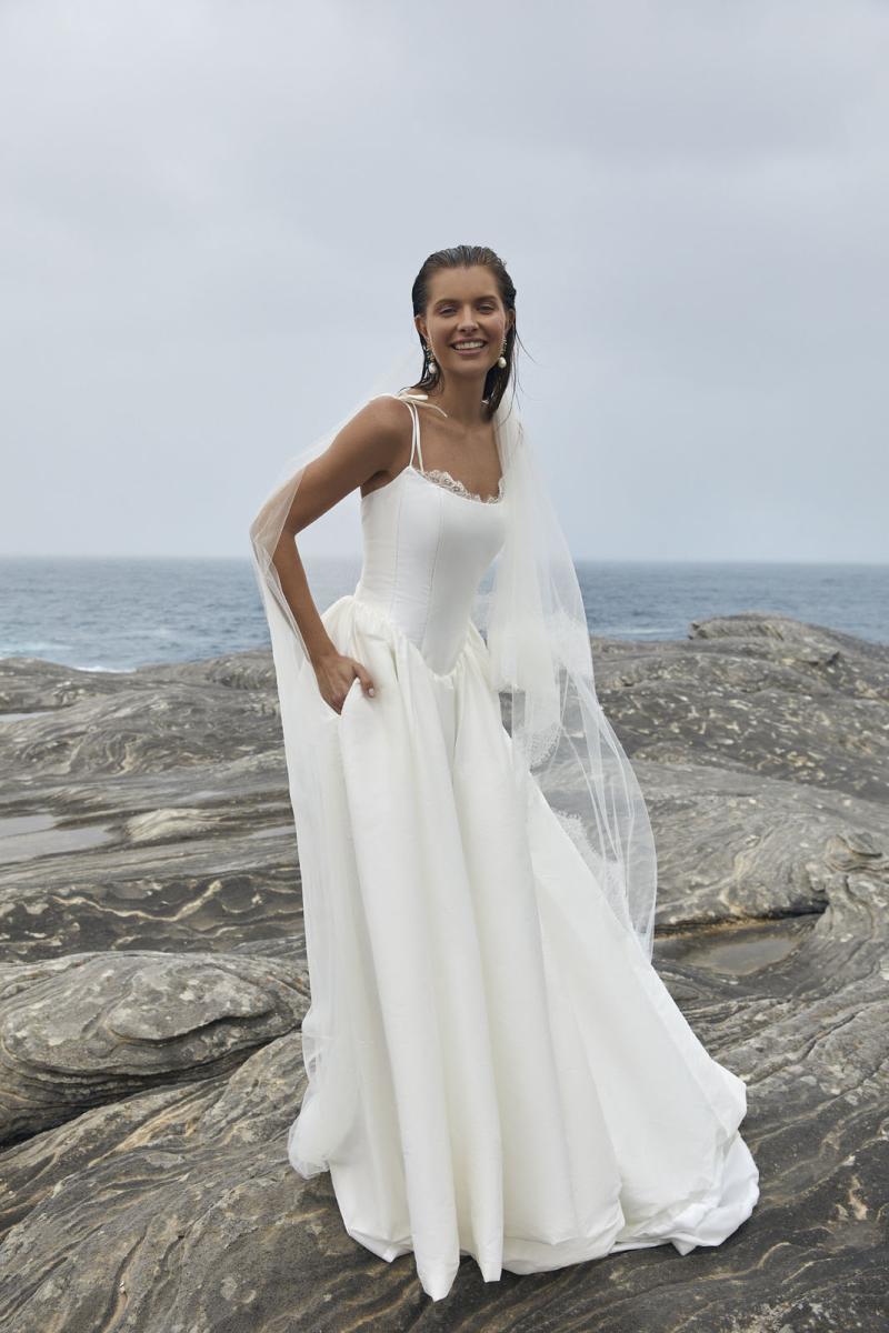 The Ciara wedding dress from KWH Bridal - Karen Willis Holmes - Scoop neck basque waist wedding gown with ballgown skirt in faux silk styled with lace wedding veil