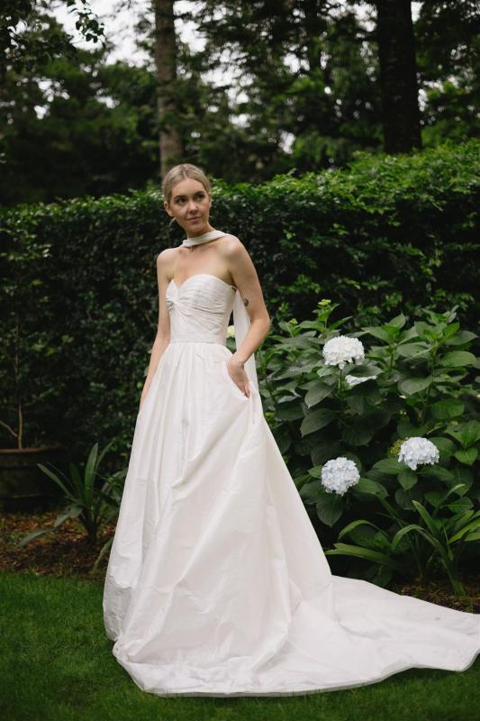 Anna wears our Madelyn Julianne gown from our Bespoke collection.