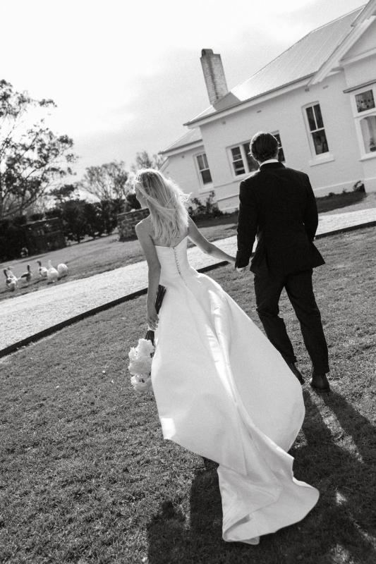 Claudia wears the Emma Mikado gown from the Bespoke collection at Karen Willis Holmes.