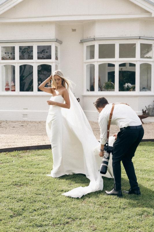 Claudia wears the Emma Mikado gown from the Bespoke collection at Karen Willis Holmes.