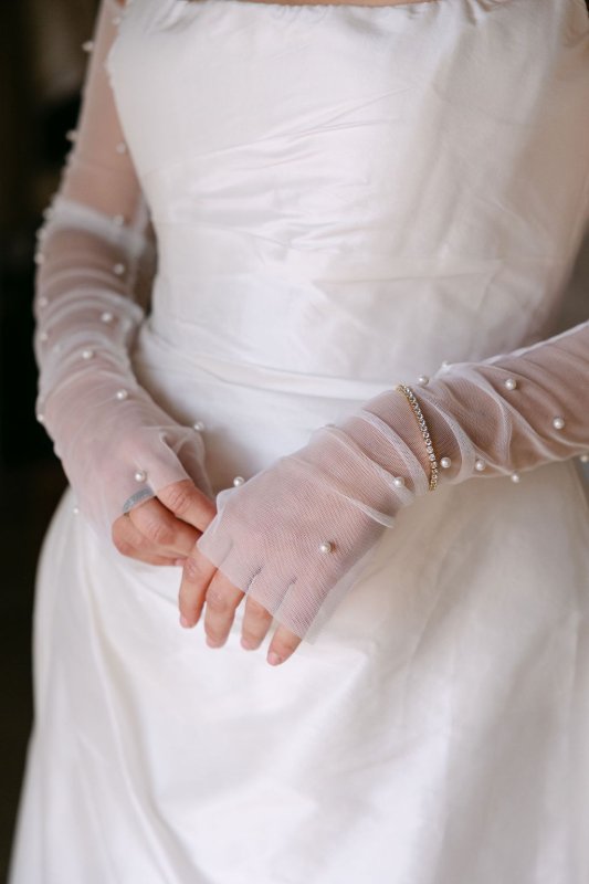 Close up of our Erin's gloves and Emma gown