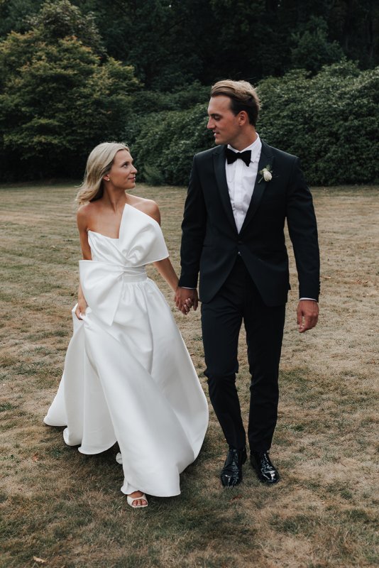 bride and groom with bride wearing ines and julianne gown