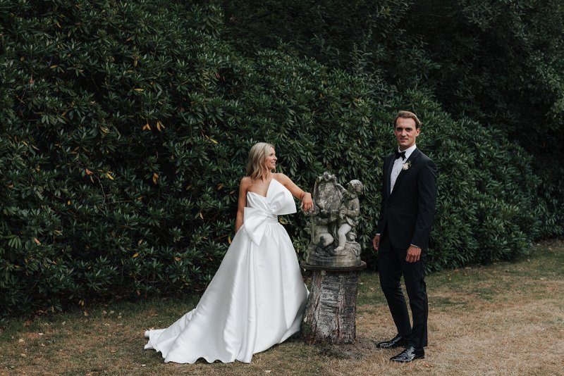 bride and groom with bride wearing ines and julianne gown