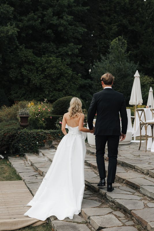 bride and groom with bride wearing ines and julianne gown