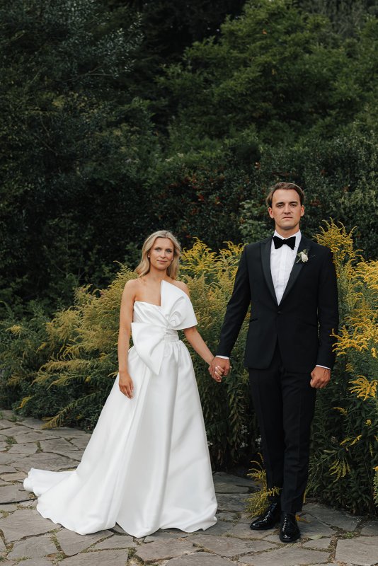 bride and groom with bride wearing ines and julianne gown