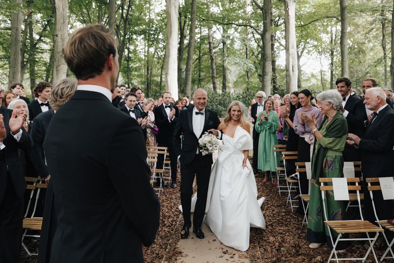 bride and groom with bride wearing ines and julianne gown